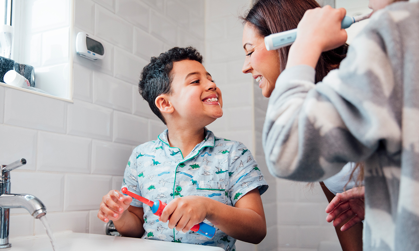 Family brushing teeth